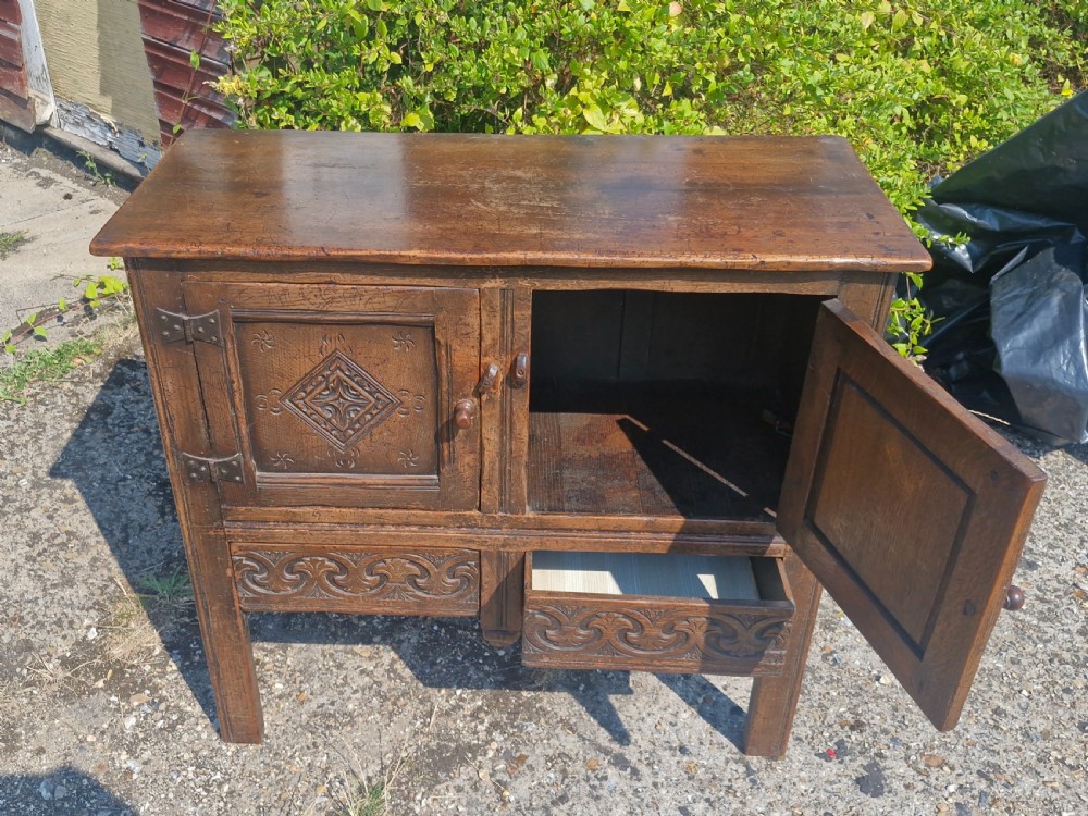 Carved Ipswich oak side cabinet  View III