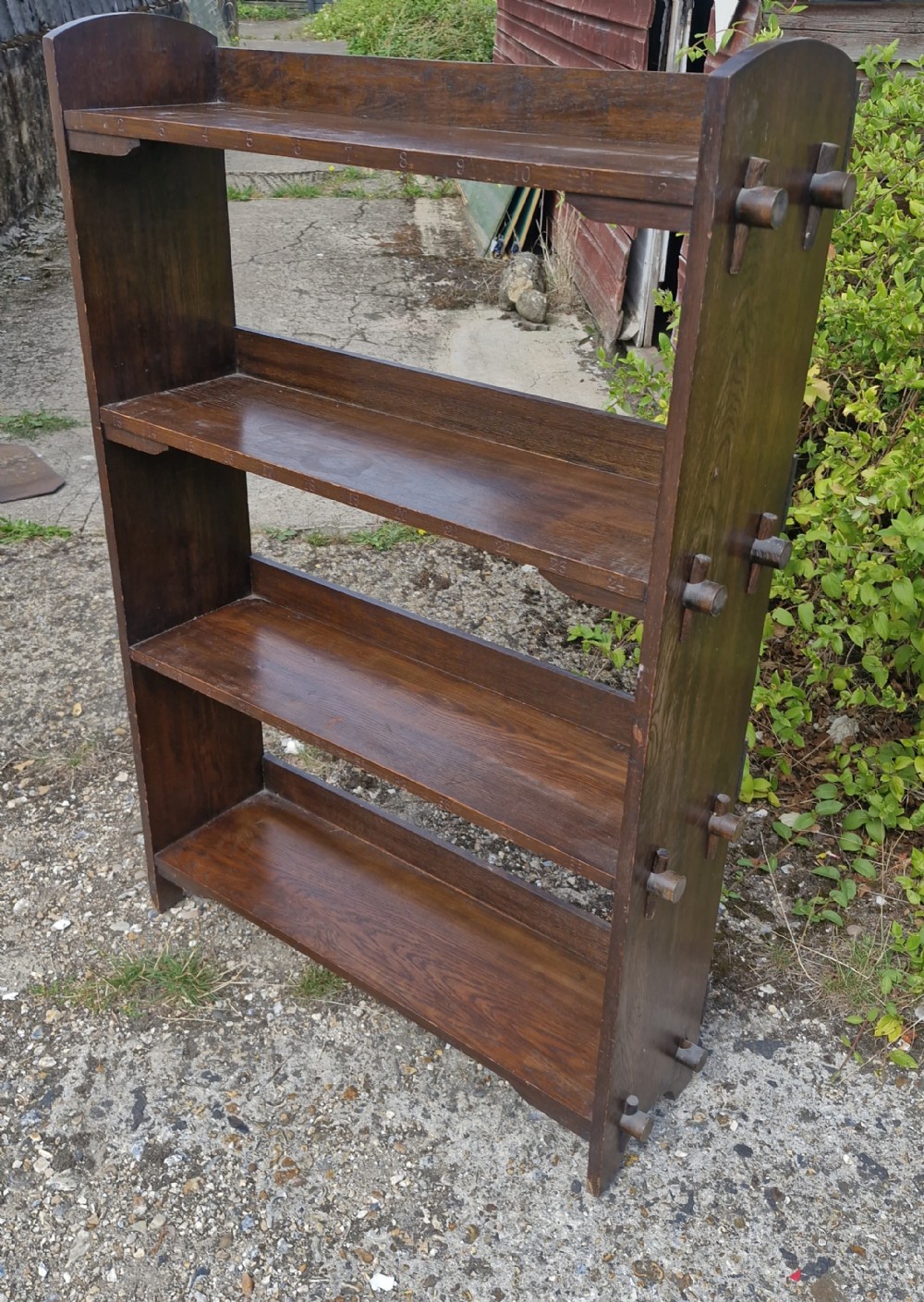 Oak Arts and Crafts bookcase of pegged construction. 