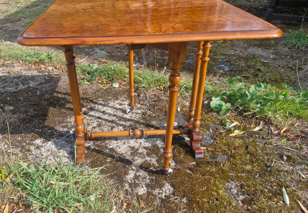 Small Victorian burr walnut drop flap Sutherland table. View III