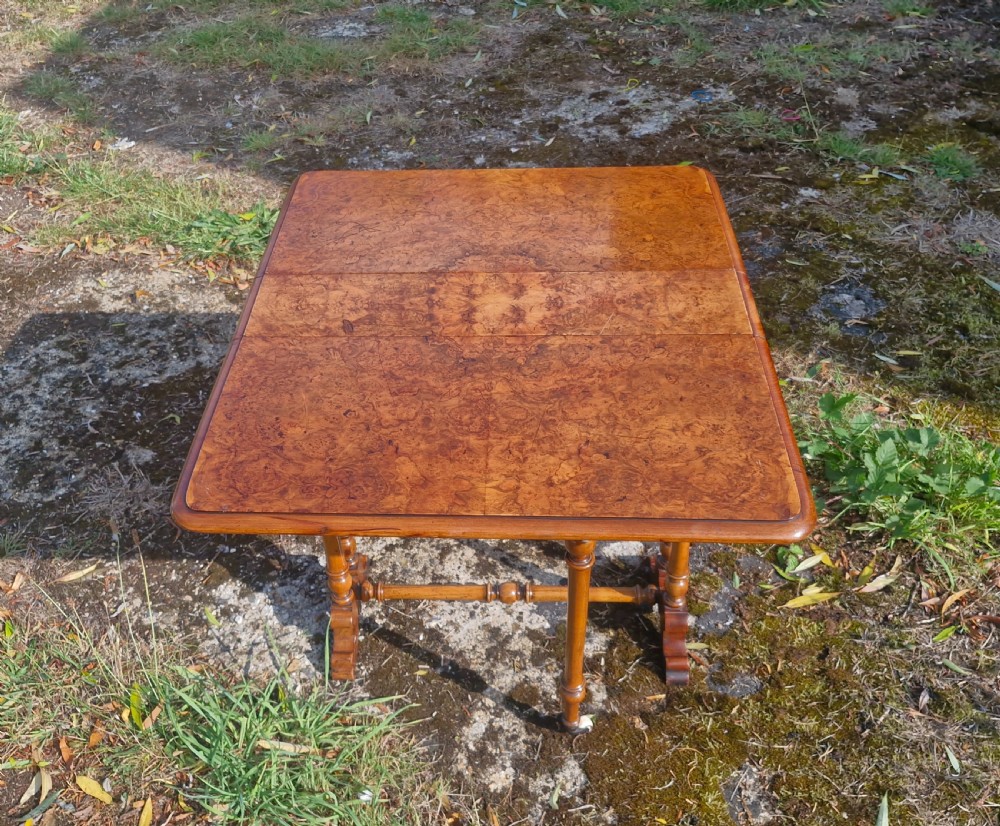 Small Victorian burr walnut drop flap Sutherland table. View IV