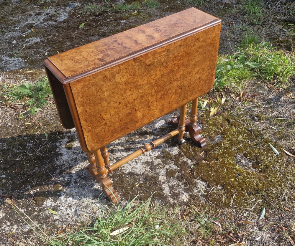 Small Victorian burr walnut drop flap Sutherland table. View VI