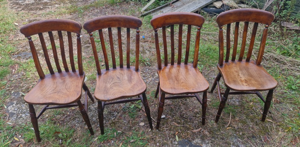 Set of 4 late Victorian slat back Windsor kitchen chairs.  View II