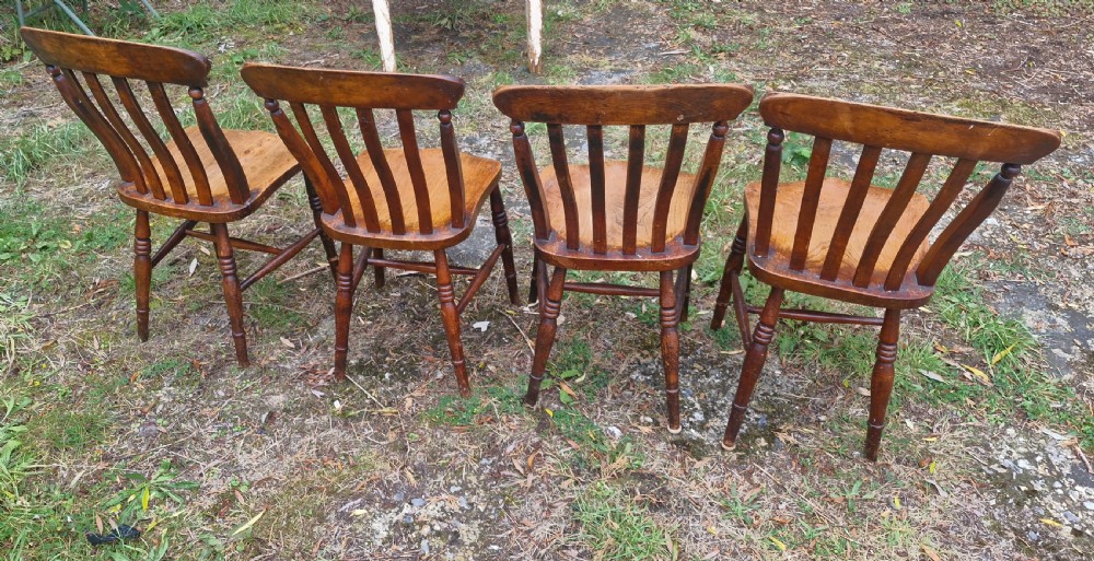 Set of 4 late Victorian slat back Windsor kitchen chairs.  View III