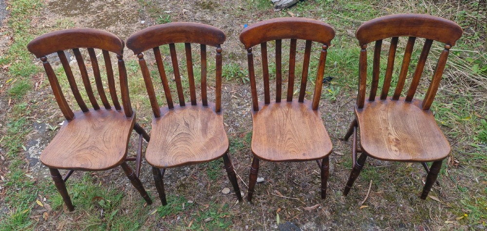 Set of 4 late Victorian slat back Windsor kitchen chairs.  View V