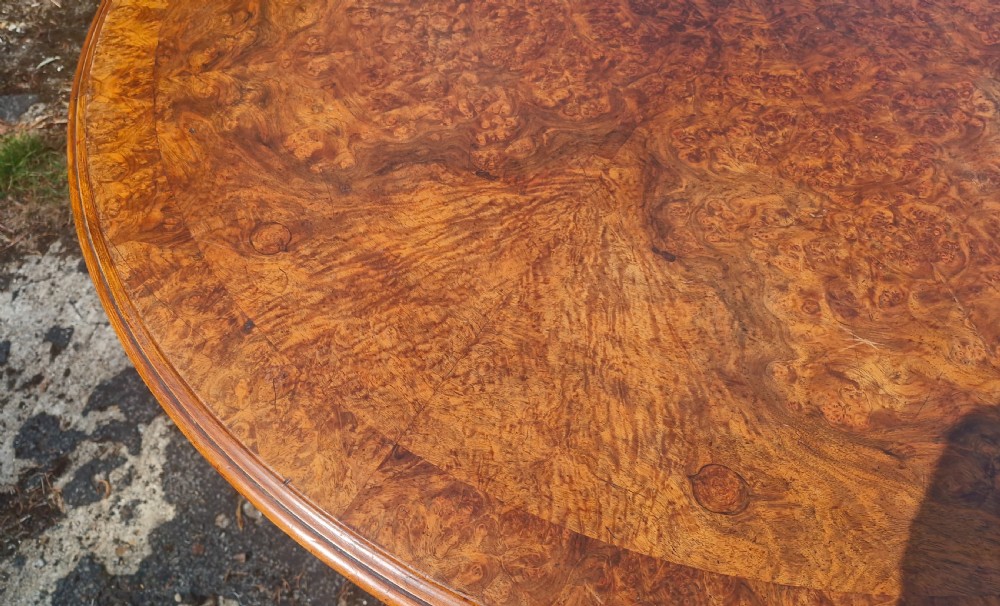 19th century burr walnut and banded centre table. View II