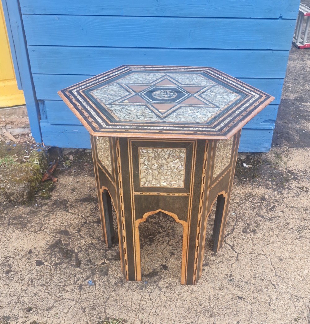 Large than normal Moorish inlaid occasional table.