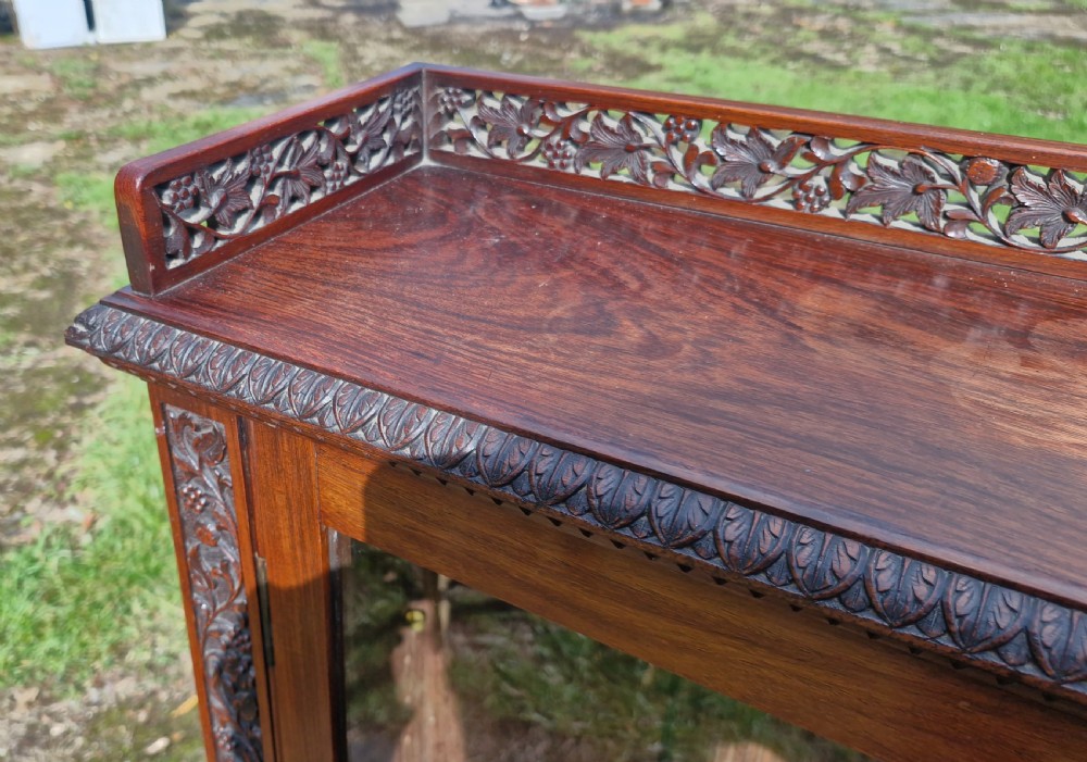 Pair of 19th century carved Anglo Indian bookcase cabinet.  View III