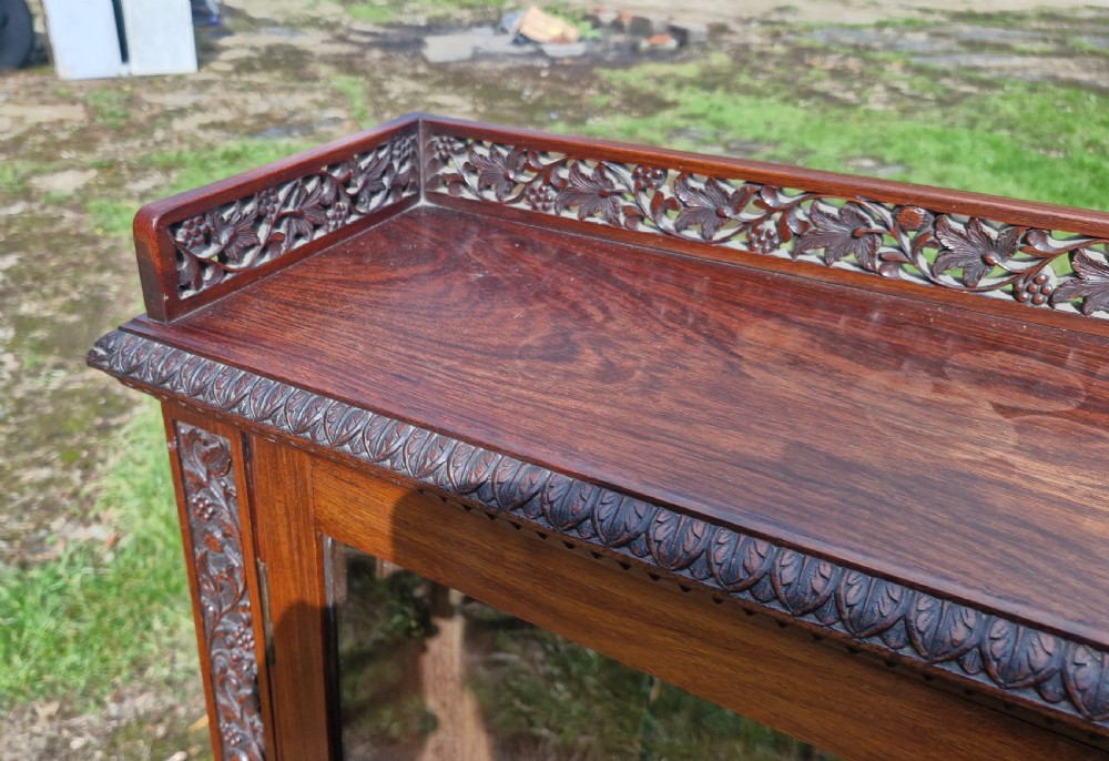 Pair of 19th century carved Anglo Indian bookcase cabinet.  View IV