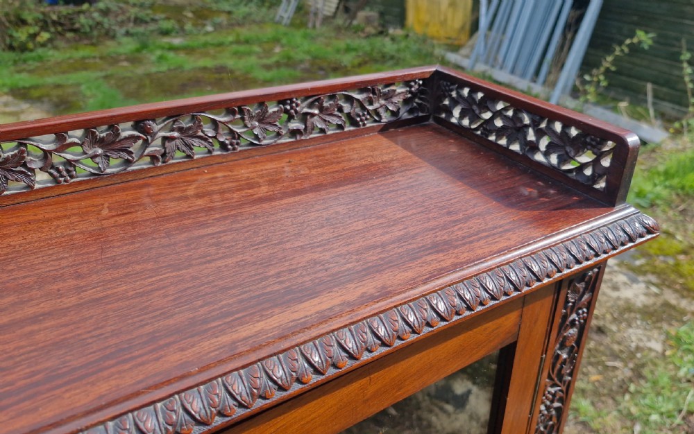 Pair of 19th century carved Anglo Indian bookcase cabinet.  View VI