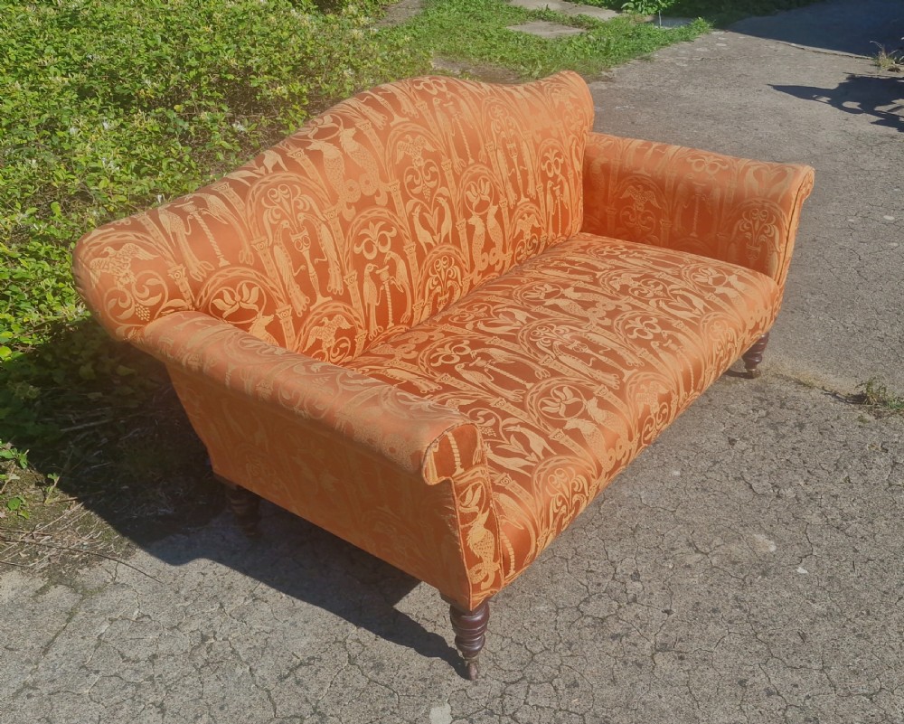 Late Victorian upholstered sofa on mahogany turned legs. View VI