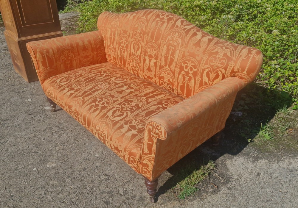 Late Victorian upholstered sofa on mahogany turned legs. View VII