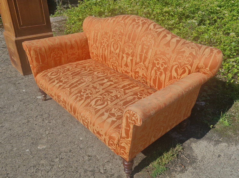 Late Victorian upholstered sofa on mahogany turned legs. View IX