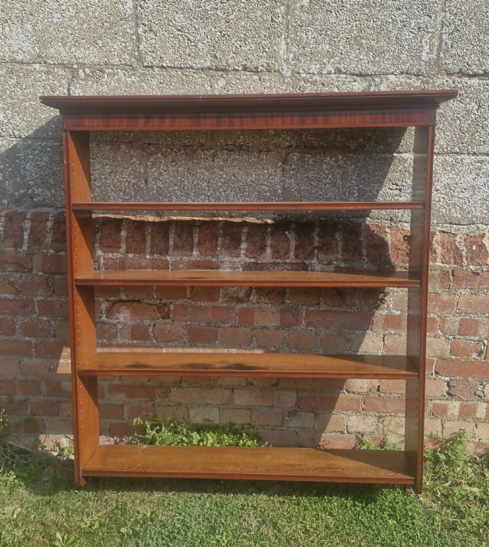 Set of Regency wall mounted book shelves.