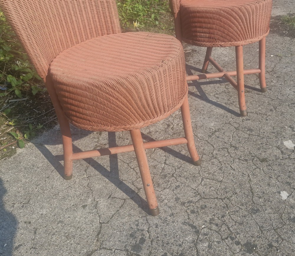Pair of Lloyd Loom bedroom chairs.  View IV