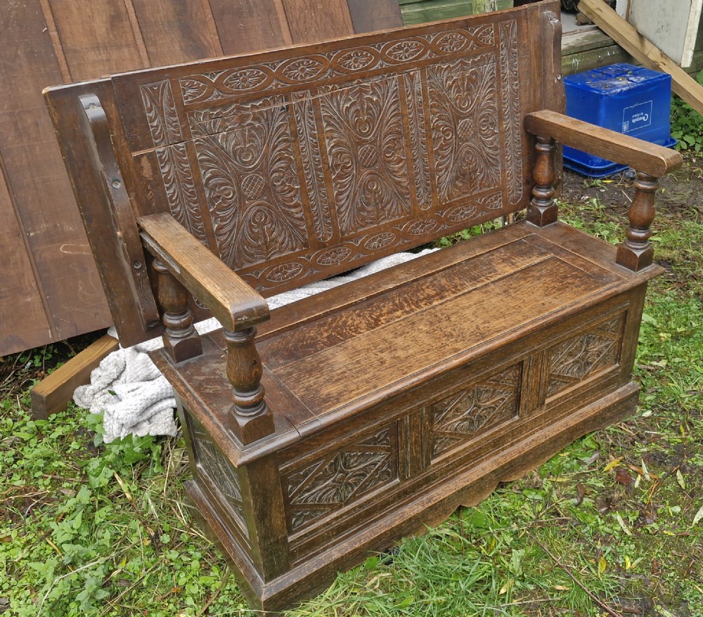 Late Victorian carved oak Monks seat. View II