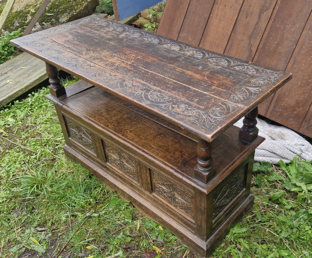 Late Victorian carved oak Monks seat. View III