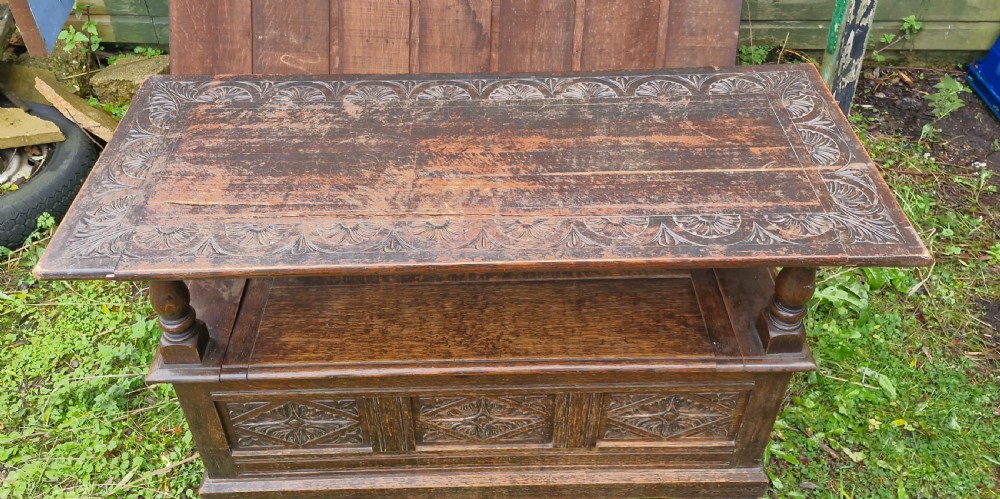 Late Victorian carved oak Monks seat. View IV