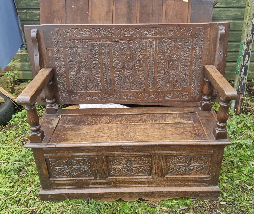 Late Victorian carved oak Monks seat. View VII
