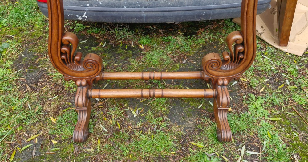 A large Regency mahogany cheval dressing mirror featuring a tilting rectangular frame set between carved scroll uprights and turned stretchers. View VII