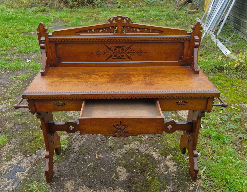Victorian oak Gothic hall table.  View VIII