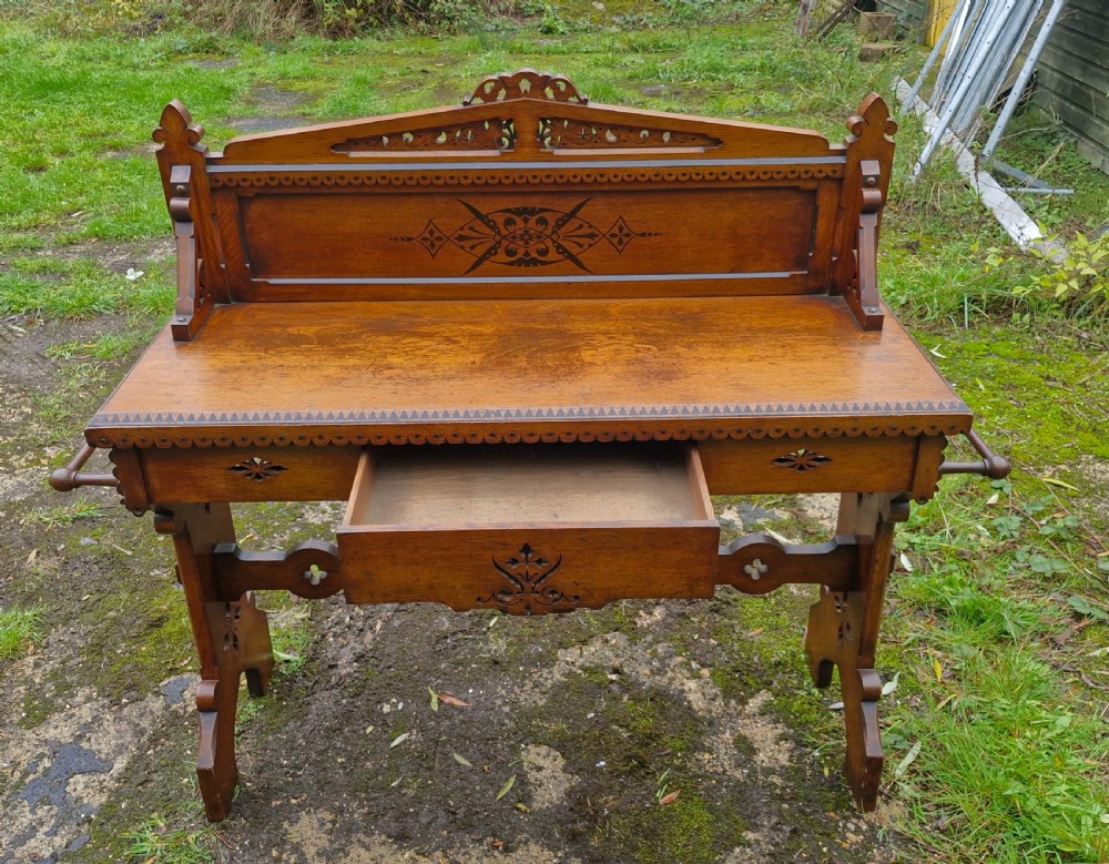 Victorian oak Gothic hall table.  View IX