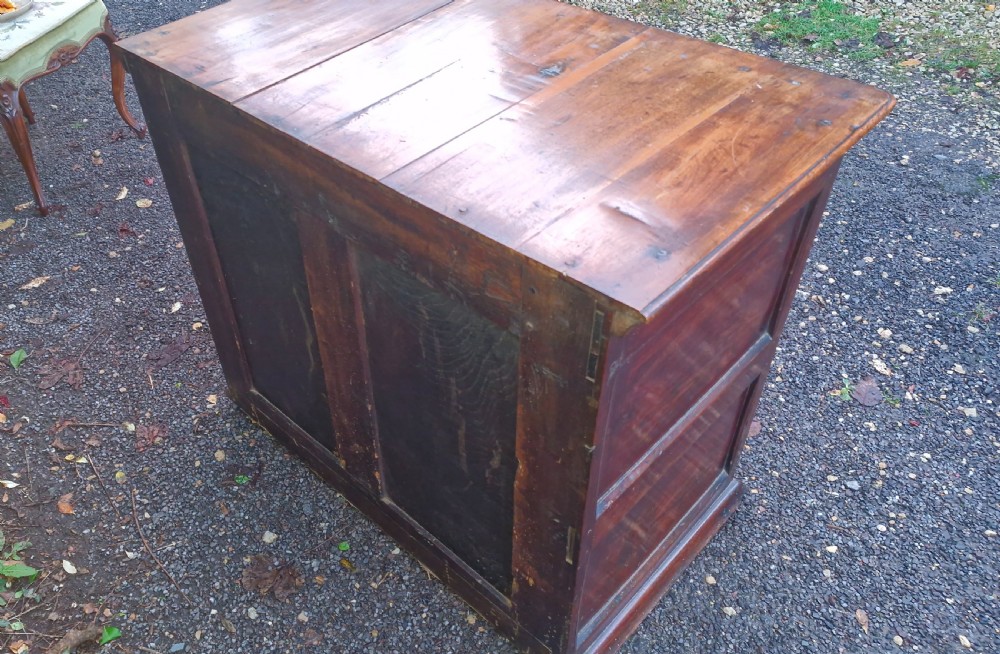 A William and Mary walnut chest featuring four graduated drawers with brass drop handles and escutcheons. View VII
