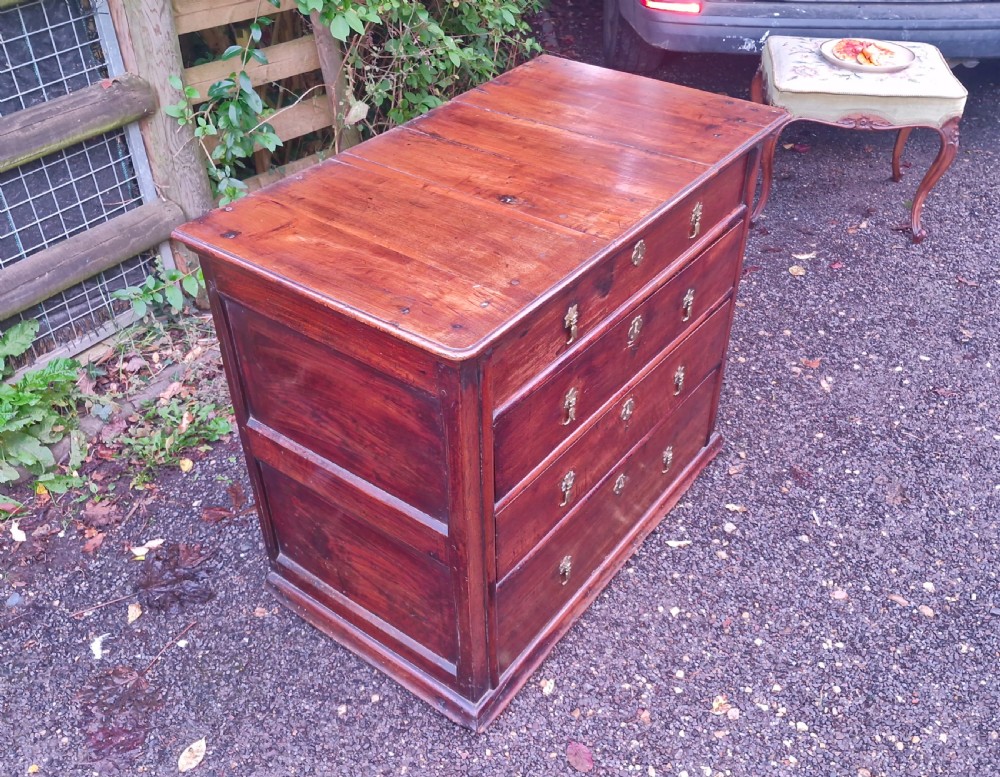 A William and Mary walnut chest featuring four graduated drawers with brass drop handles and escutcheons. View IX
