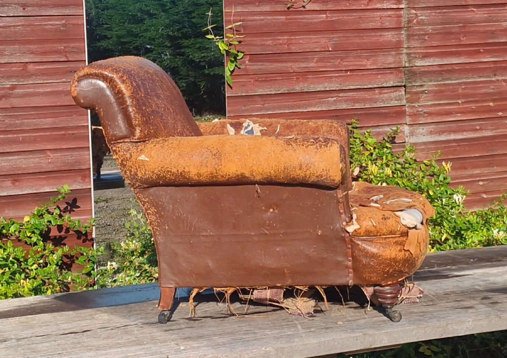 Very Large upholstered library armchair in the style of Howard.  View IX