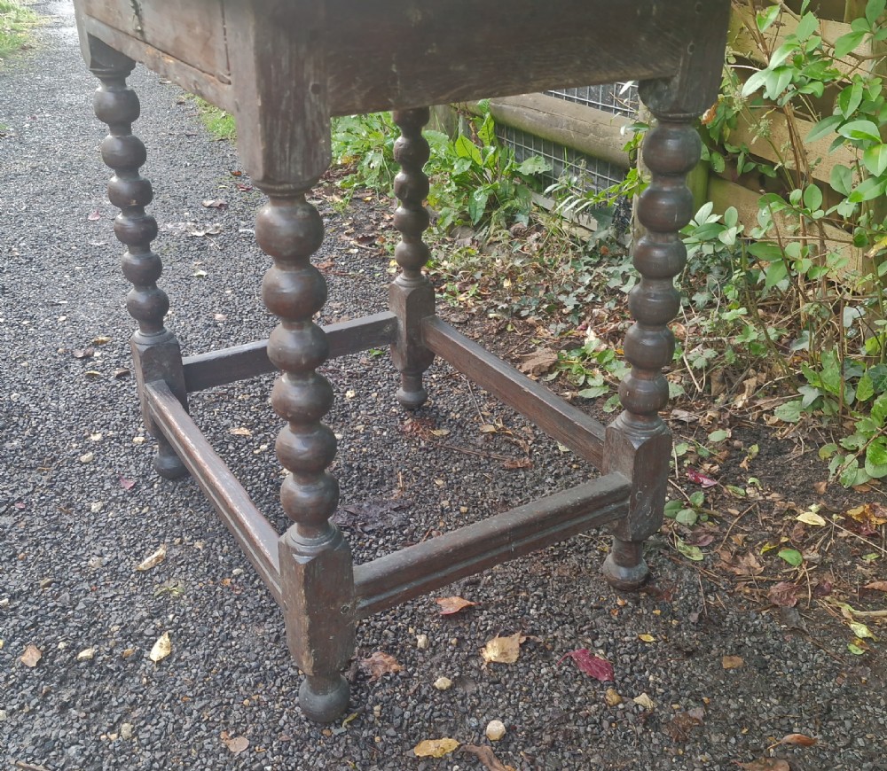 Georgian oak bobbin leg single drawer side table. View II