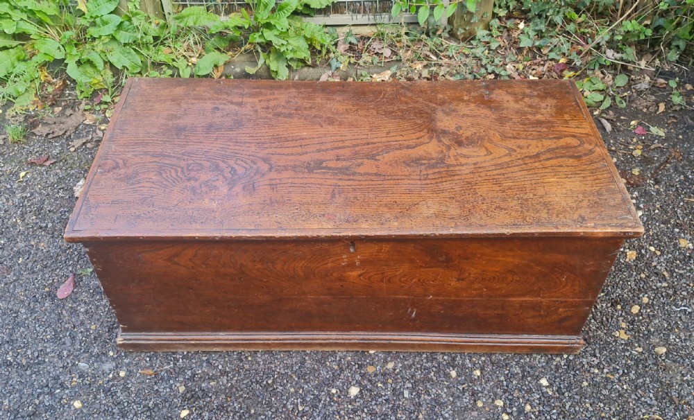 Early 19th elm blanket chest.