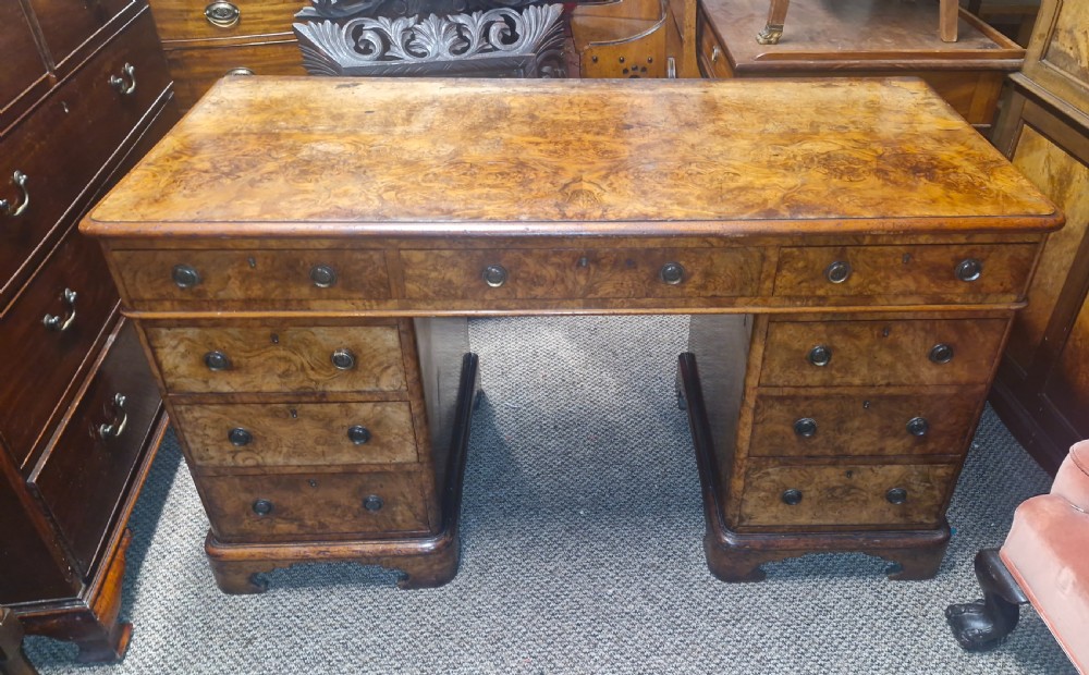 Victorian burr walnut kneehole pedestal writing desk.  View VI