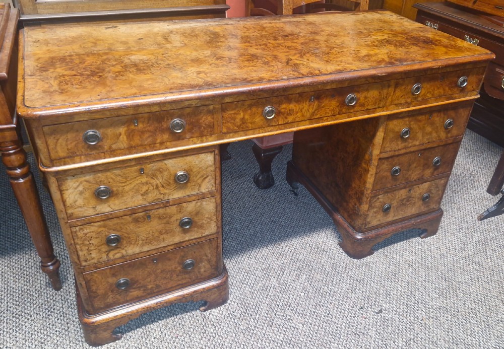 Victorian burr walnut kneehole pedestal writing desk.  View IX