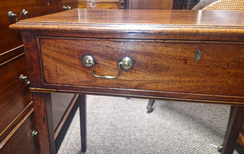 Elegant late Georgian mahogany single drawer side table.  View IV
