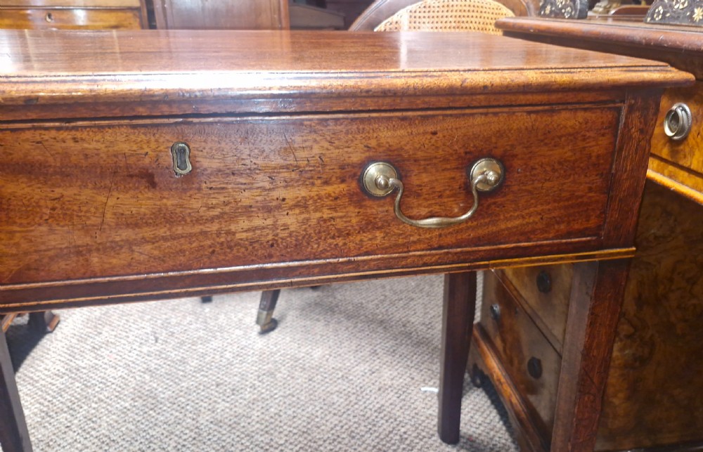 Elegant late Georgian mahogany single drawer side table.  View V