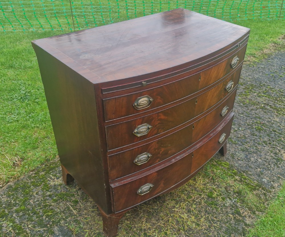 Regency mahogany bow front chest with brushing slide.  View IV