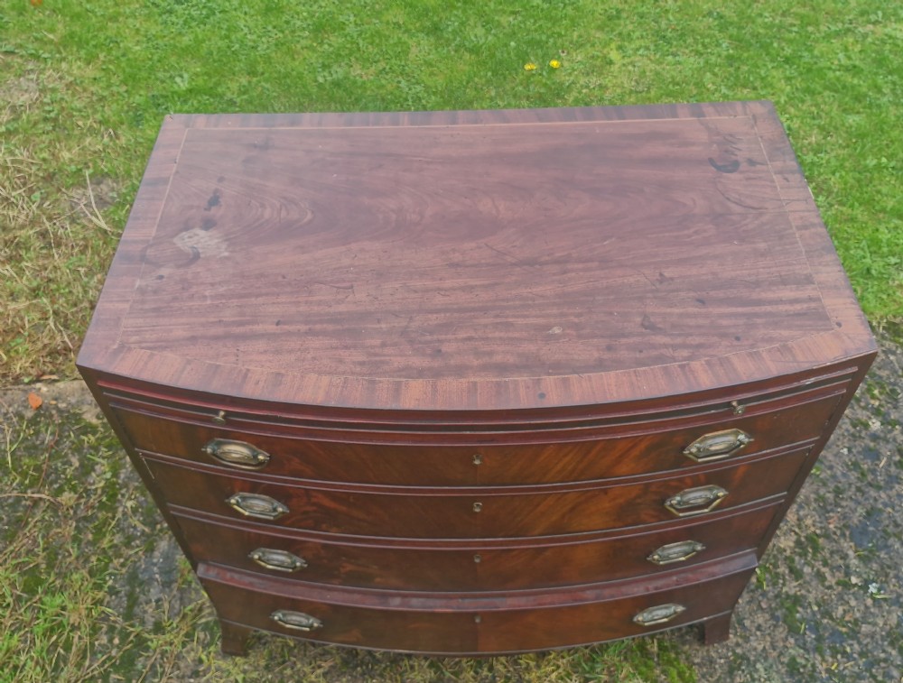 Regency mahogany bow front chest with brushing slide.  View VI