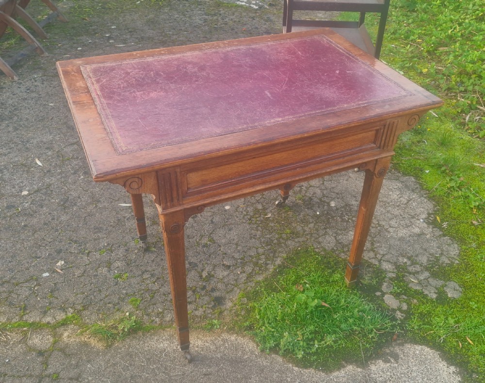 Oak free standing writing table with original leather.  View II