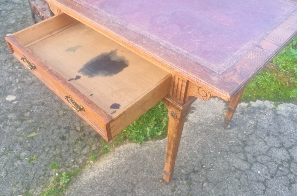 Oak free standing writing table with original leather.  View III