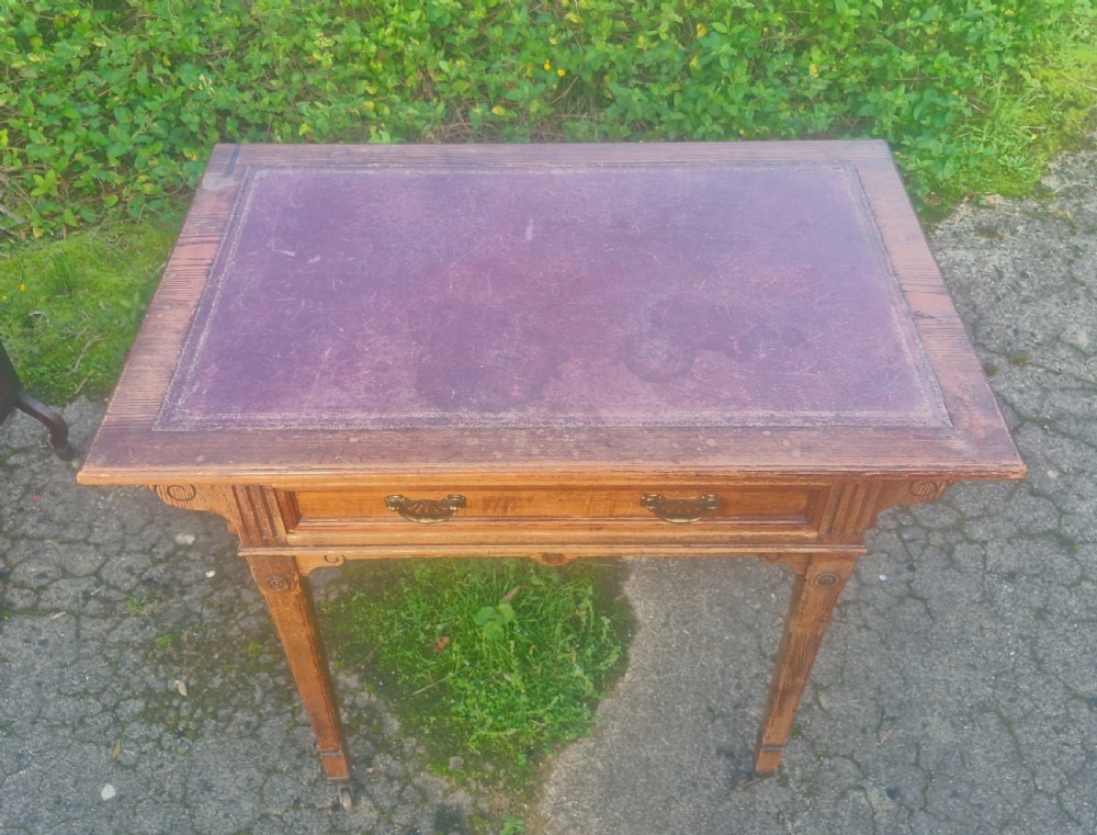 Oak free standing writing table with original leather.  View V