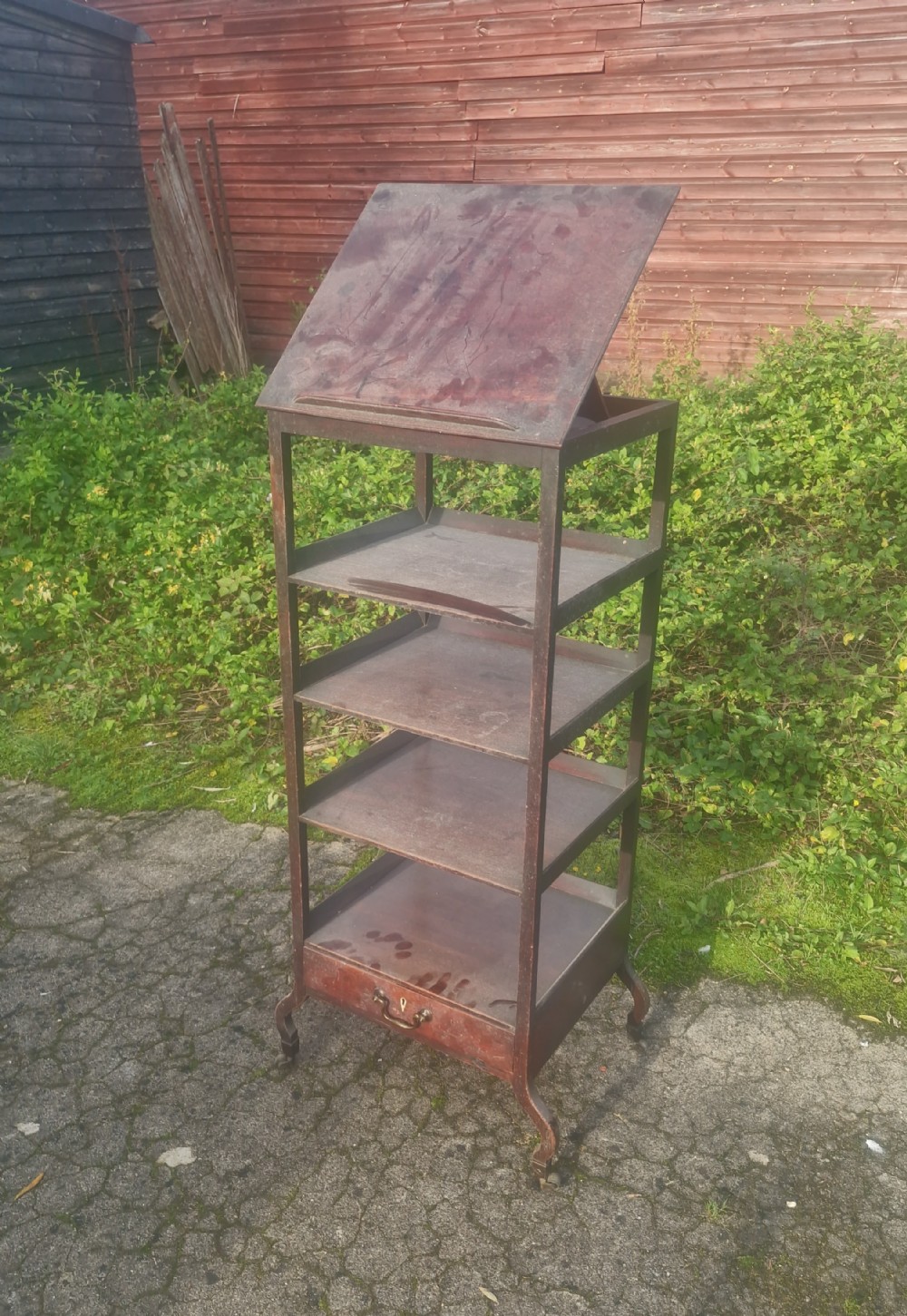 Original untouched Regency whatnot with adjustable reading slope.