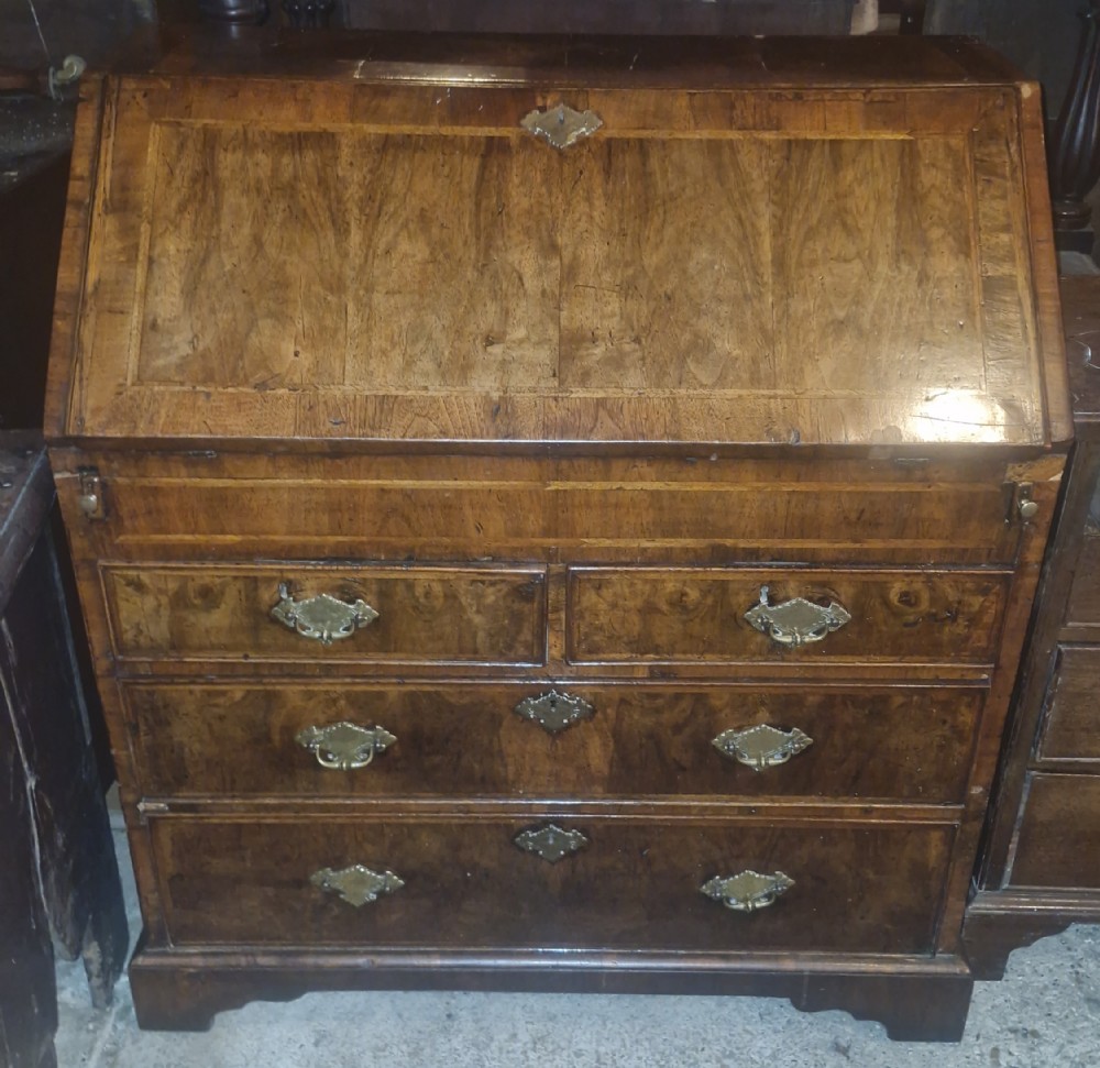Early 18th century walnut bureau. 