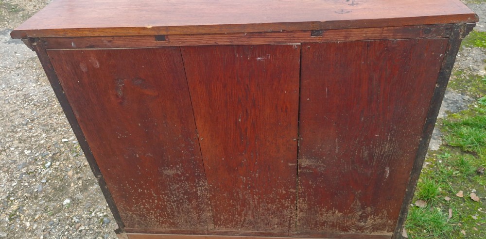 Early 18th century walnut chest of drawers.  View VI