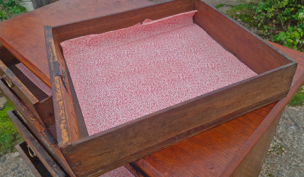 Early 18th century walnut chest of drawers.  View VII