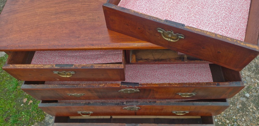 Early 18th century walnut chest of drawers.  View VIII