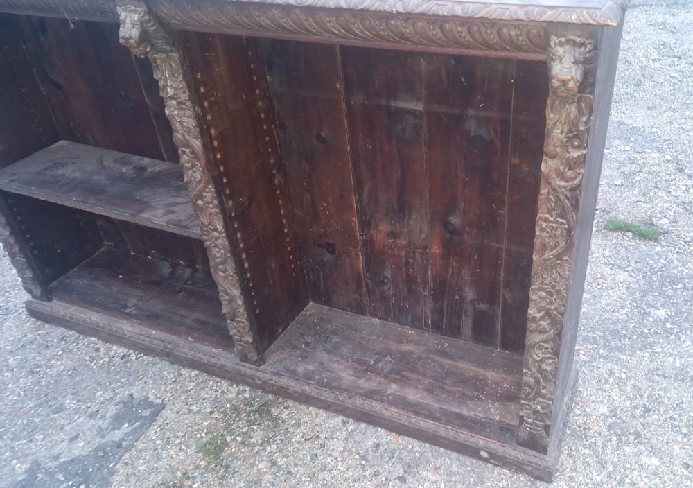 Late Victorian carved oak open bookcase.  View IV