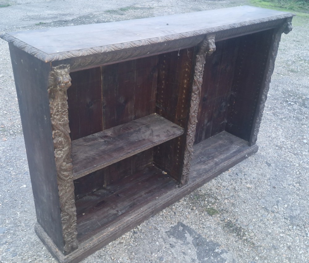 Late Victorian carved oak open bookcase.  View VII