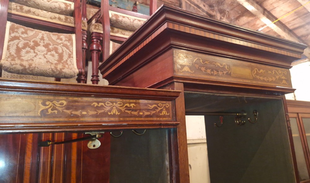 Edwardian inlaid mahogany triple wardrobe.  View VIII