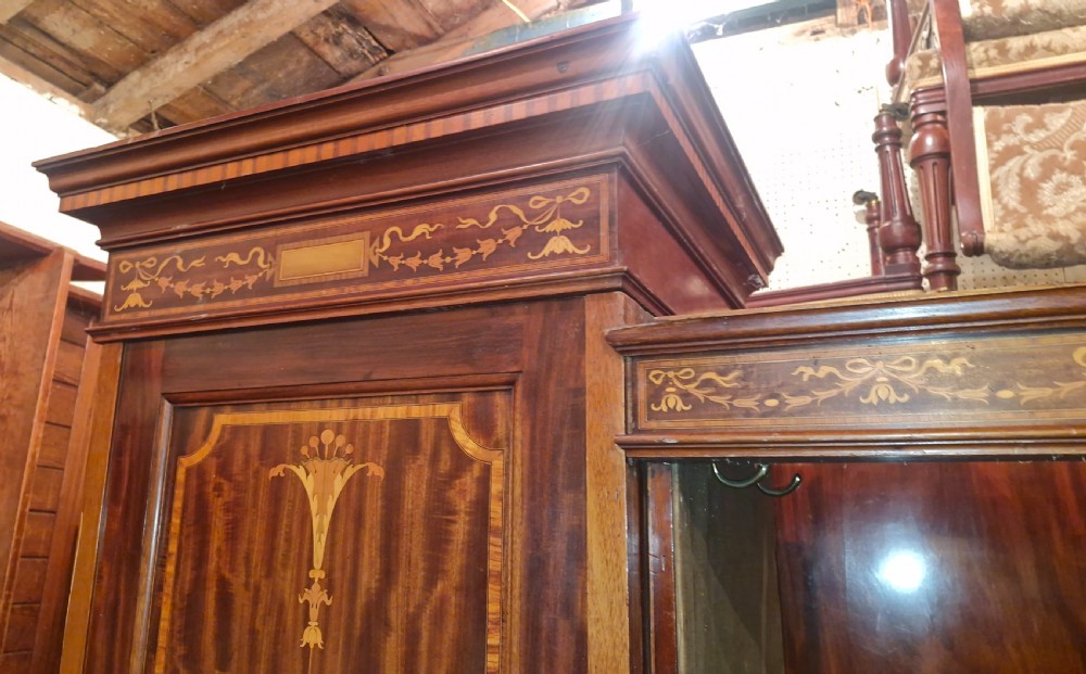 Edwardian inlaid mahogany triple wardrobe.  View X
