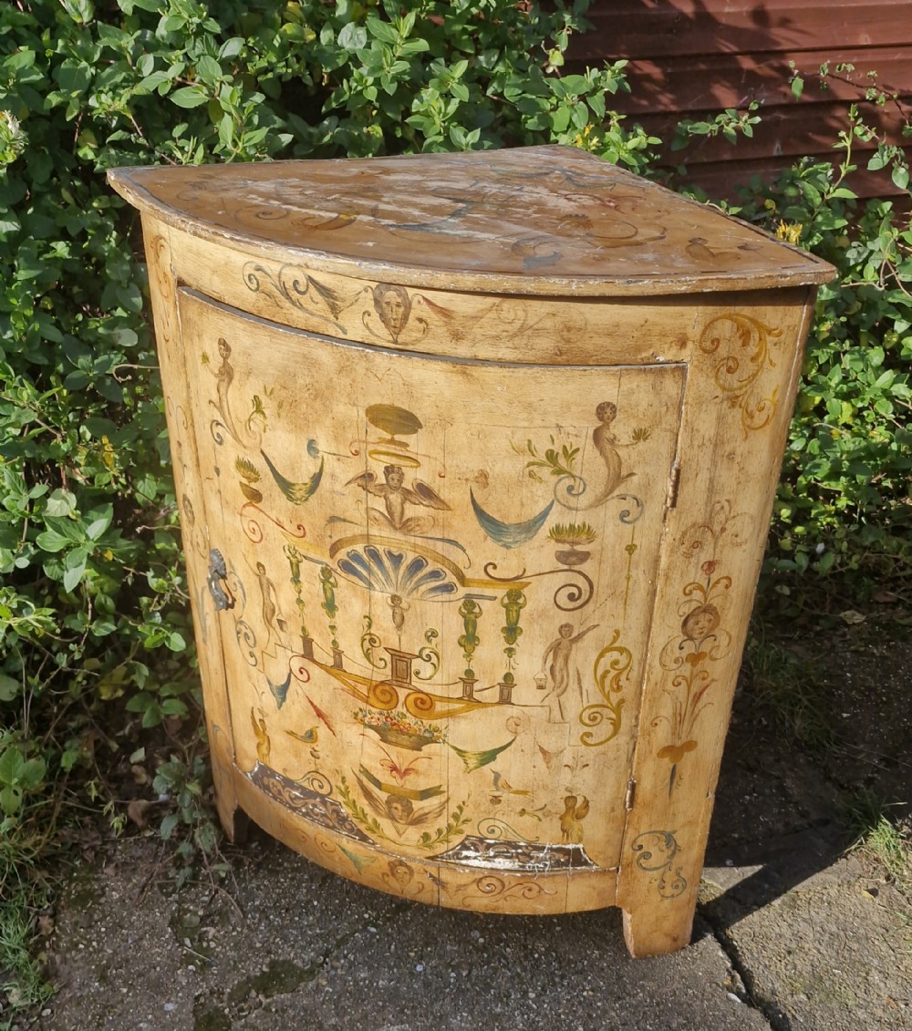 Decorative painted corner cupboard. 