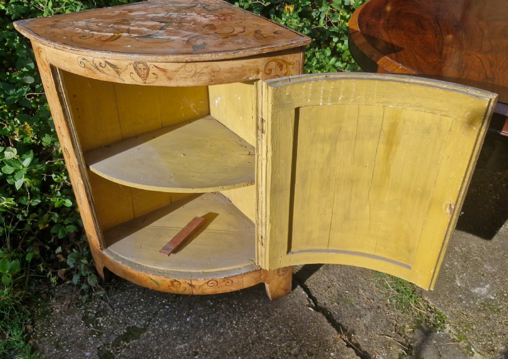 Decorative painted corner cupboard.  View VI